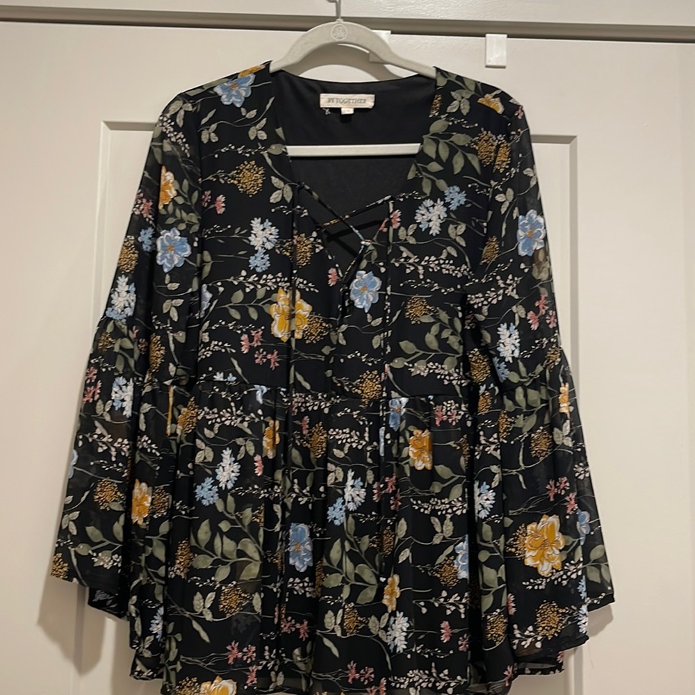 Floral and black top. Beautiful top.